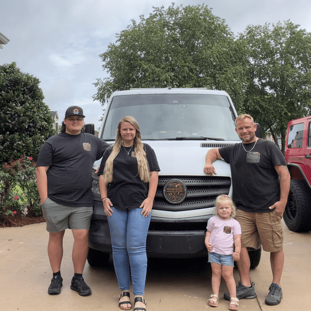 The Rolling Stone Auto Repair team with their mobile service van in Warner Robins, GA